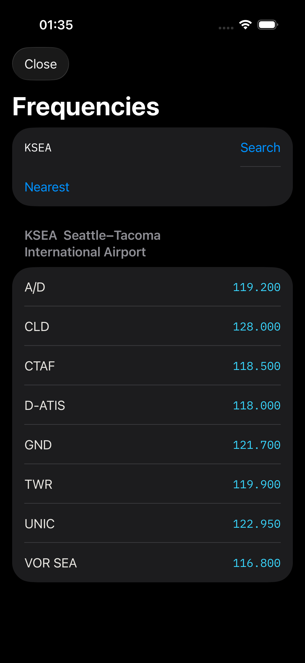 DETENT airport lookup listing COM and VOR frequencies for KSEA